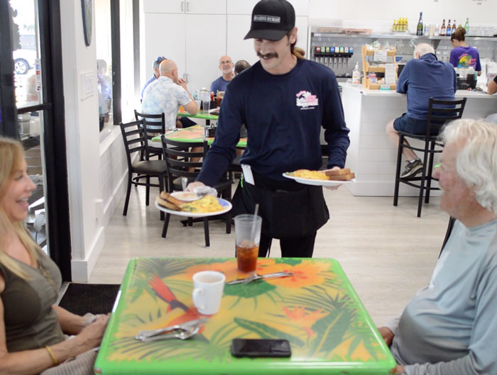Guests dining at Juno Beach Cafe